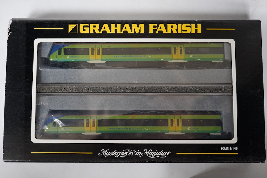 Three boxed Graham Farish N gauge railway DMU train packs; a South West Trains 170/4 2-car DMU (371-427), a Midland Mainline 170/1 Turbostar 2-car DMU (371-425), and a Central Trains Turbostar 170/5 2-car DMU (371-426).